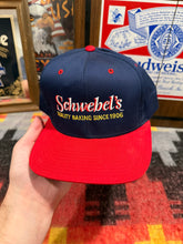 Load image into Gallery viewer, Vintage Schwebels Baked Goods SnapBack Hat
